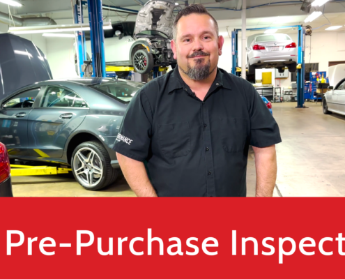 man standing in a German auto shop